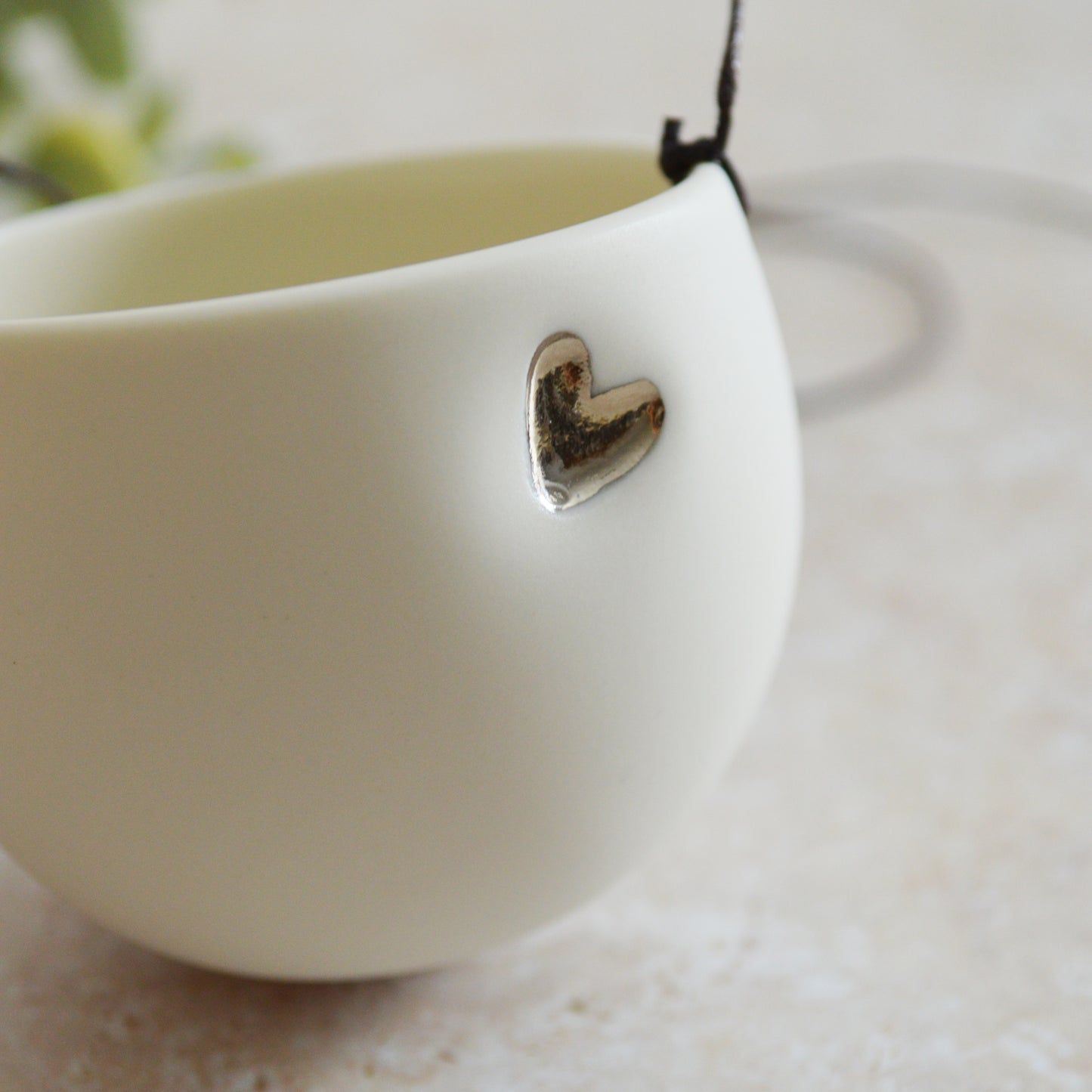 Seconds* Discontinued* Small Hanging Planter with a Silver (Platinum) Embossed Heart and Brown String for Hanging | Porcelain | Hanging Planter (B28)