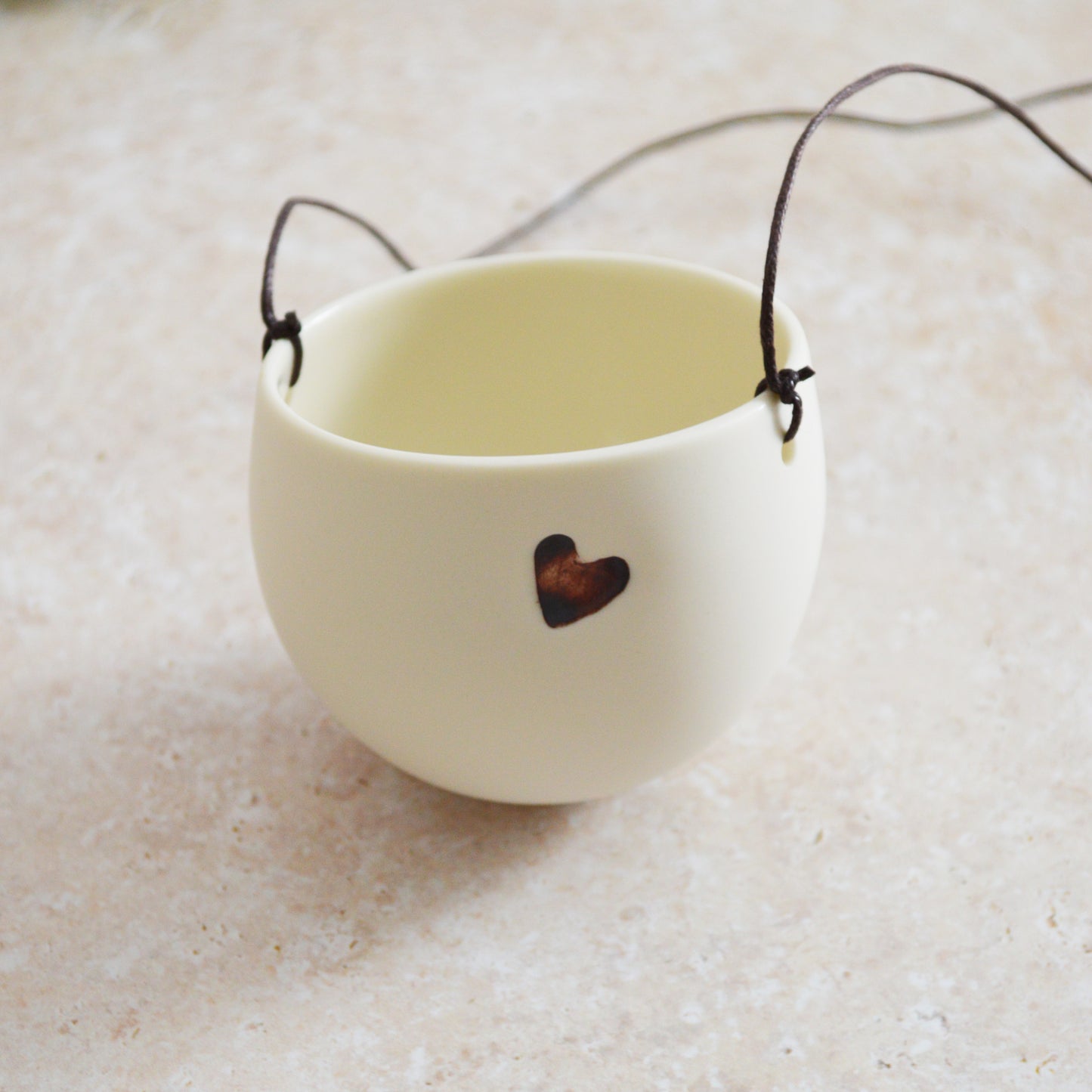 Discontinued* Small Hanging Planter with a Oxide Embossed Heart and Brown String for Hanging | Porcelain | Hanging Planter (B30)